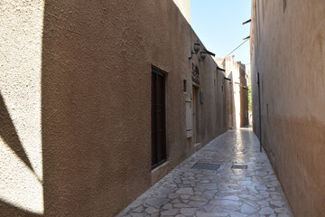 Fototapeta na wymiar Deserted narrow streets of an Arab city