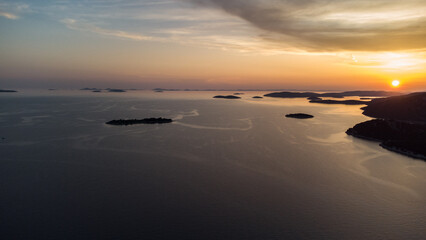 Fototapeta na wymiar Sunset Drone areal view over islands. Church. Croatia