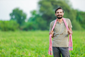 Naklejka na ściany i meble Maharashtra look farmer, happy farmer standing in Cwopea farm