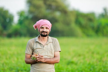 Maharashtra look farmer, happy farmer standing in Cwopea farm