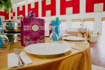 Wedding gift bag on a table. Catering table decor. Wedding ceremony.