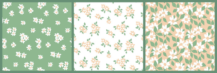 Seamless floral pattern, pretty liberty ditsy print set. Cute, romantic botanical design in pastel colors: small hand drawn chamomile flowers, tiny leaves on a light background. Vector illustration.