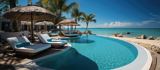 Fototapeta premium Generative ai illustration of a Luxurious swimming pool and loungers umbrellas