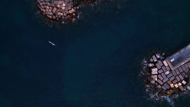 Aerial view of Aci Trezza, a seaside village in the countryside near Catania in Sicily.
Traditional harbor on the cliff overlooking the stacks of the mythologyIslands of Greek mythology of Polyphemus.