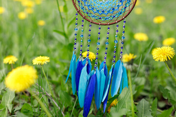 Handmade dream catcher with feathers threads and beads rope hanging