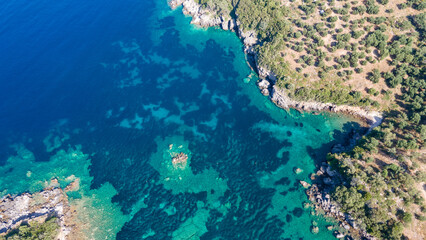 Aerial view of sea waves and fantastic Rocky coast, Greece. Top view of coastal rocks in Ionian Sea. Landscape view point of Ionian Sea  in the morning.