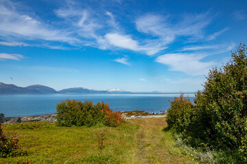 Stunning view of mountains and fords in Norway.Lattervik, red ship