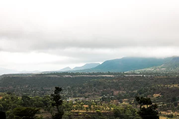 Foto op Canvas The wondrous landscape of forest with mountains in monsoon at Saputara hill station, Gujarat, India. © Rohan Divetiya 