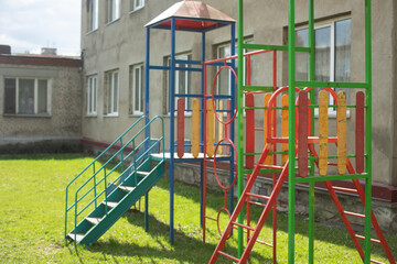 Fototapeta na wymiar Children's playground in yard. Ladder for game. Children's area.