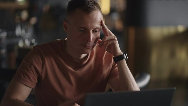Nervous Financial Director Looking At Display Of Laptop, Portrait Of Freelancer In Cafe, Online Work