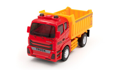 Model of toy dumper truck isolated on white.