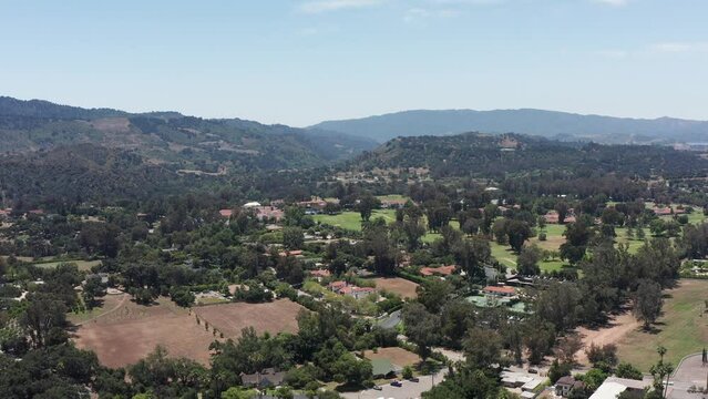 Super wide aerial shot of the luxurious Ojai Valley Inn resort in Ojai, California. 4K