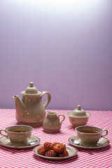 table prepared for snack, for two, lenten fritters, holy week.