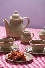 table set for snack, for two, lenten fritters, easter. close up