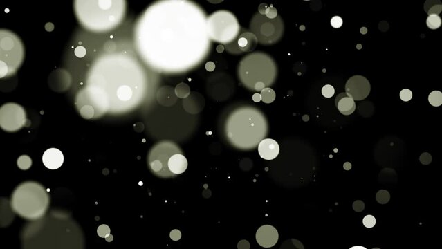 White circles bokeh particles abstract background on black background. Futuristic glittering in space.