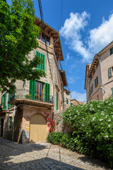 Narrow streets in historic center of town of Valldemossa, Balearic Islands Mallorca Spain.