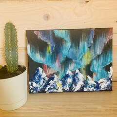 Oil painting on canvas northern lights. Author's art decorative acrylic painting for interior Northern Lights over the mountains.