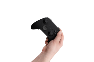 Joystick in hand on a white background. Gamepad in hand closeup isolated on white background.