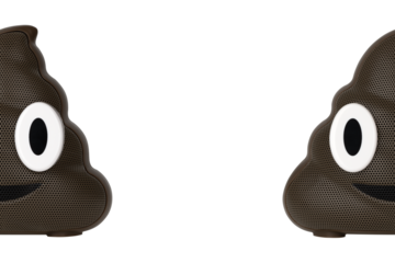Wireless speaker on a white background. Wireless speaker in the shape of a poop close-up isolated on a white background.