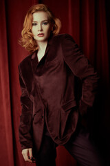 woman in velvet suit