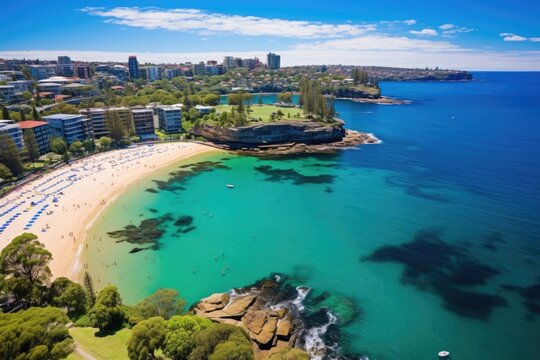 Shelly Beach and Cabbage Tree Bay, located in the suburb of Manly, can be seen from an elevated perspective. This aerial view provides a glimpse of the renowned beach and the picturesque surroundings