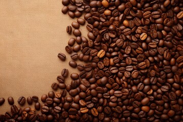 Coffee beans on burlap background