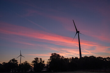 Landscape with Turbine Green Energy Electricity, Windmill for electric power production, Wind turbines generating electricity on farm fields. Clean energy concept. High quality photo