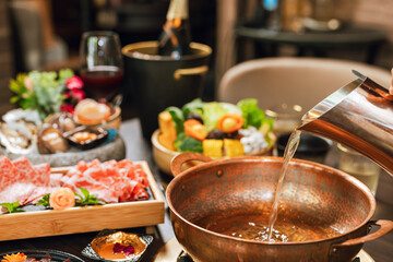 Seafood cuisine plate and beef sliced meat for hot pots. pork slices, scallops,  seashells, oysters, caviar and other seafood delicacies.