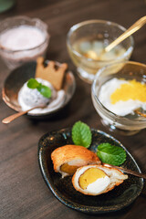 The dessert with sweet white cream Egg Yolk.