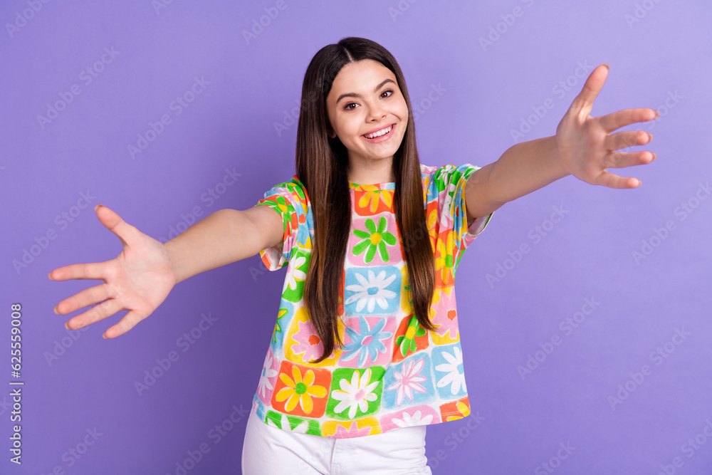 Sticker Photo of friendly positive teen girl child hugs hello friendly satisfied good mood welcome our company isolated on purple color background