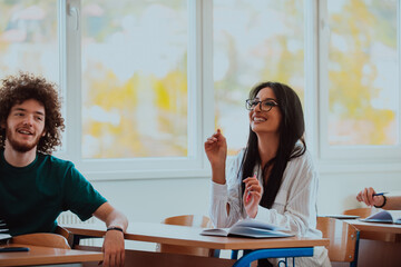 A black-haired female student wearing glasses is attentively engaged in a modern classroom, embracing education and learning with focus and curiosity