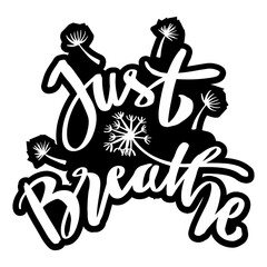 Just breathe with dandelions flower. Hand lettering typography.