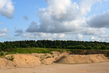 Sandy hills, grassland, forest.