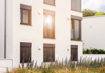 Roller Blind Windows Outside. External Blinds of Modern Building. Window Shutters Outdoor. Sun...