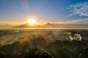sunrise and misty morning