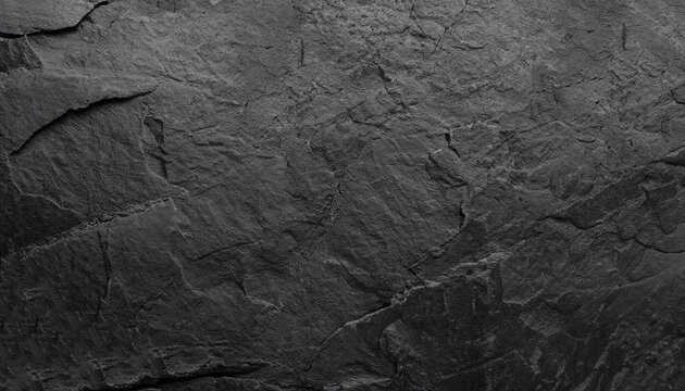 Black abstract background. Dark rock texture. Black stone background with copy space for design. Web banner. Wide.