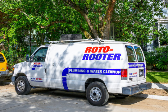 Roto-Rooter Service Van in an Uptown Neighborhood on July 19, 2023 in New Orleans, Louisiana, USA