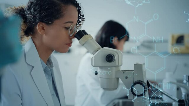 Multinational group of scientists experimenting and chemical technology concept. Research and development. 