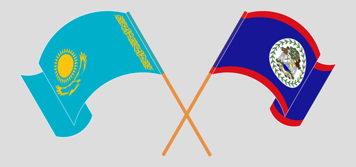 Crossed and waving flags of Kazakhstan and Belize