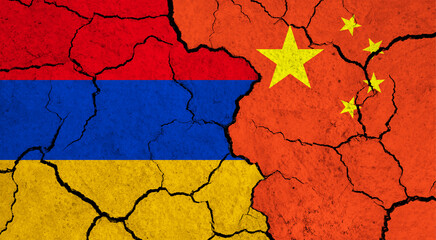 Flags of Armenia and China on cracked surface - politics, relationship concept