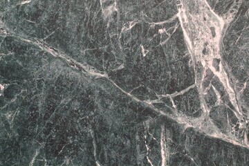 Close-up of grey marble texture abstract background. Polished ceramic natural stone backdrop. Decorative pattern. Gray granite design floor