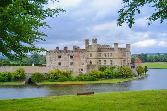 England, Leeds, 15.6.2017: Leeds Castle in not very good weather with a gray sky but with a beautiful view of the lake
