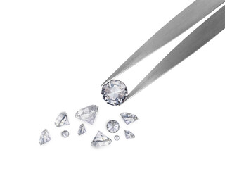Diamond in tweezers, transparent background