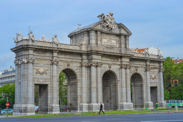 Fototapeta na wymiar Spain, Madrid, 26.05.2016: The Puerta de Alcalá is a neoclassical gate in the Plaza de la Independencia in Madrid