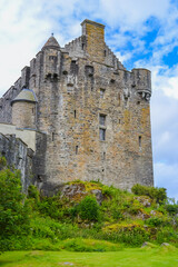 Fototapeta premium Scotland, Edinburgh, 13.07.2017: Eilean Dongnan is a Scottish castle tidal island situated at the confluence of three sea lochs in the western Highlands of Scotland