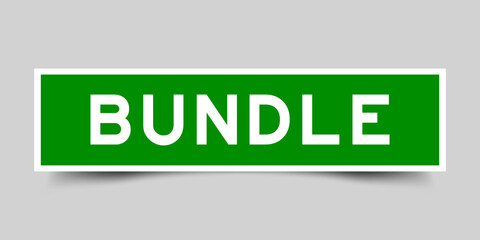 Green color square label sticker with word bundle on gray background