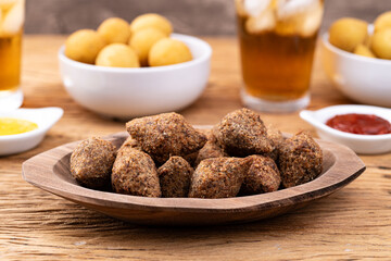 Traditional arabic fried tiny kibbeh. Typical brazilian snack