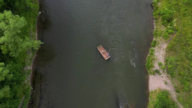 Drone shot of raftsmen in a traditional raft, Dunajec river, Pieniny, Poland