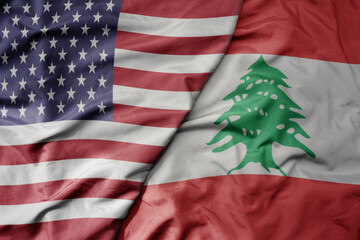 Obraz premium big waving colorful flag of united states of america and national flag of lebanon .