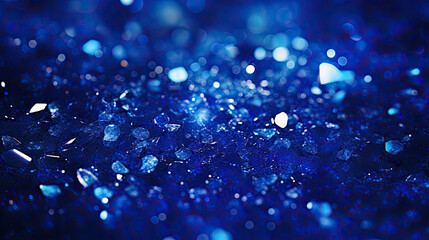 Sapphire glitter bokeh background. Unfocused shimmer royal blue sparkle. Crystal droplets wallpaper